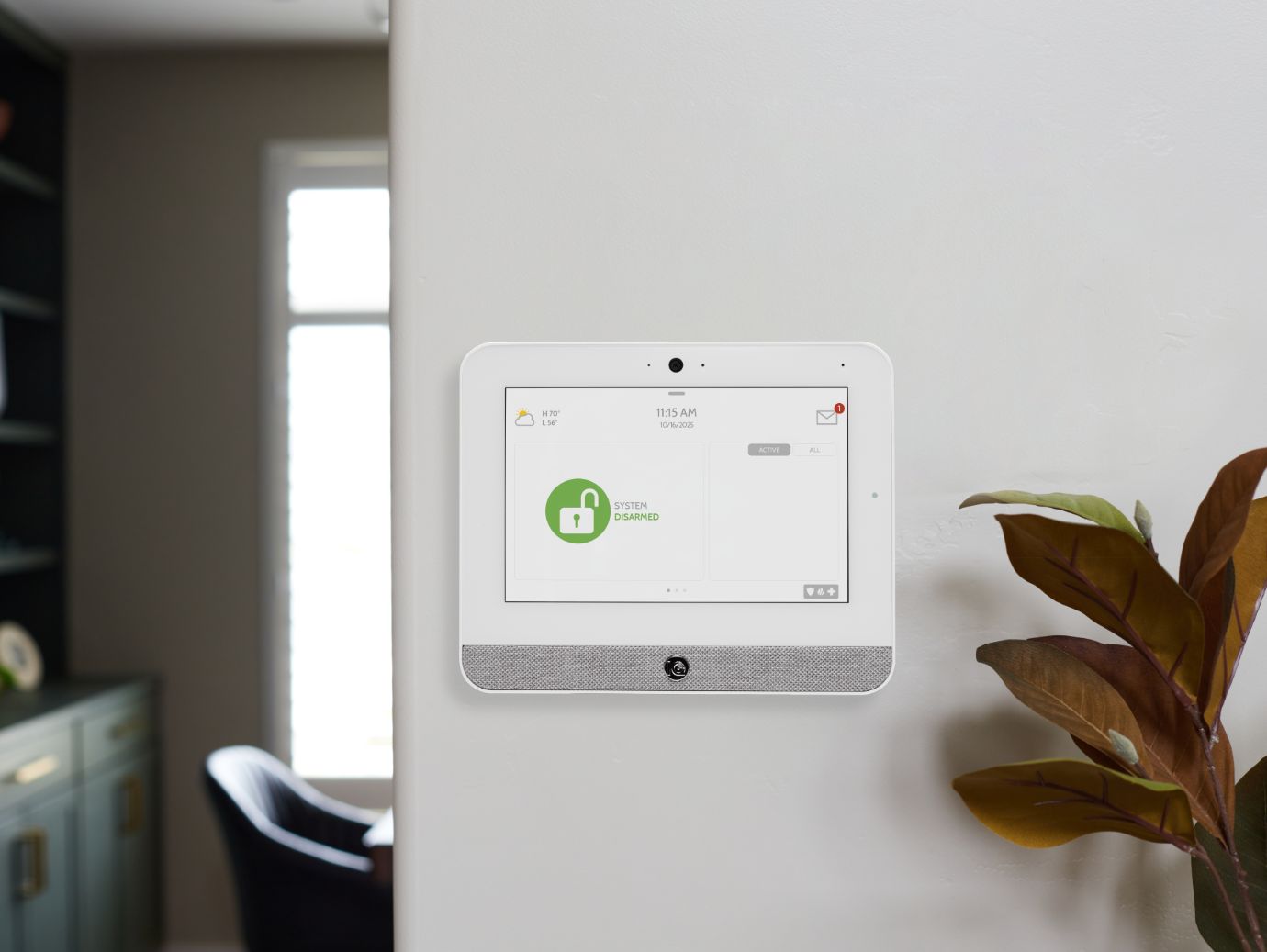 Qolsys IQ Panel 5 alarm touchscreen installed in a home
