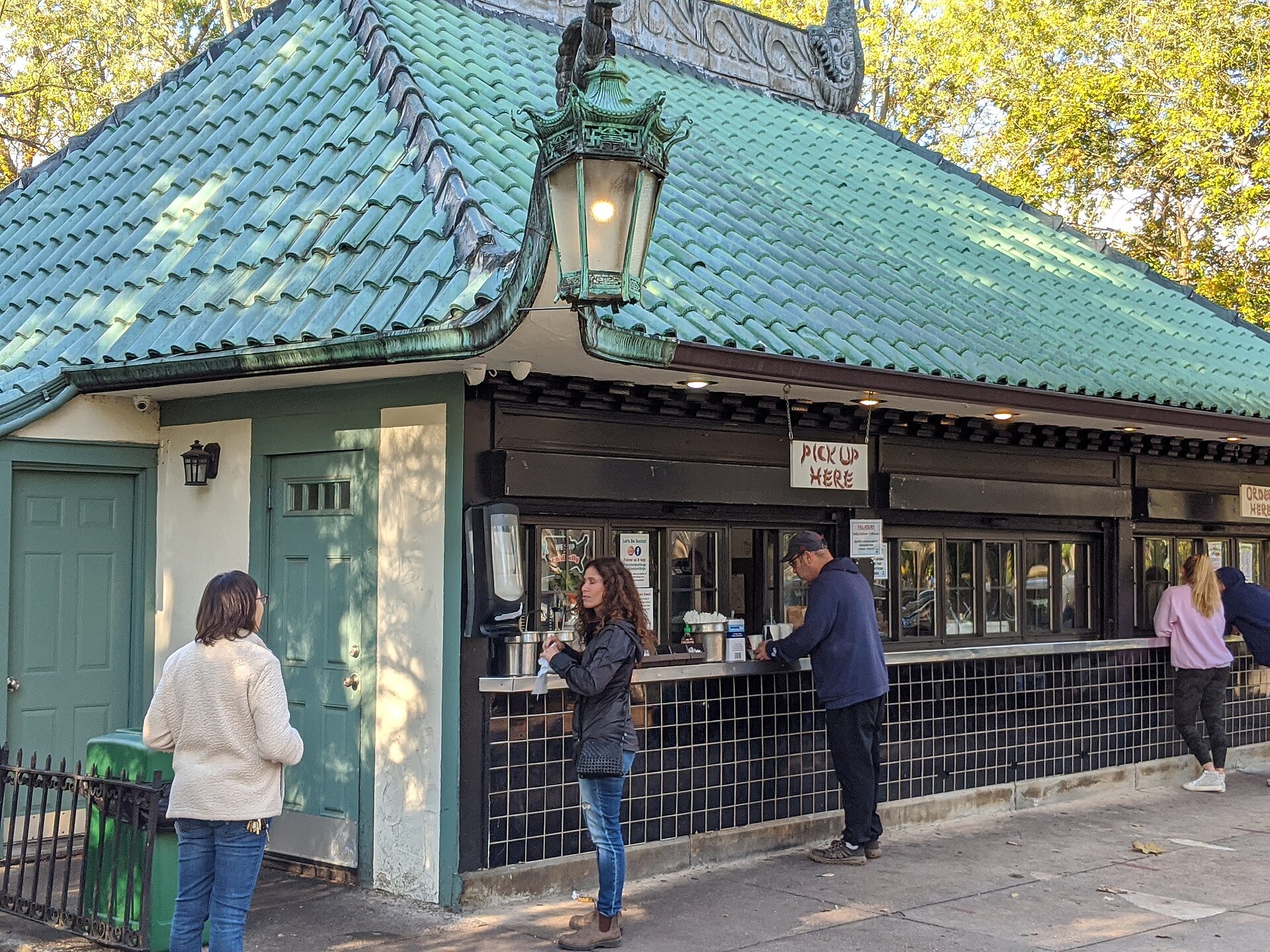 Green pagoda-style roof and counter at Walter’s Hot Dog Stand in Mamaroneck
